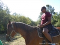 Climbing on a horse is hard.