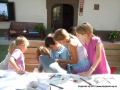 Making a poster about farm animals.