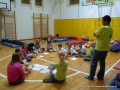 Nik is helping children with their English.