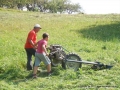 Cutting the grass.