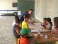 The younger group will make a poster about the photography...