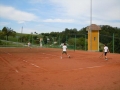Playing tennis