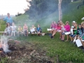 At the camp fire