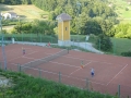 Playing tennis
